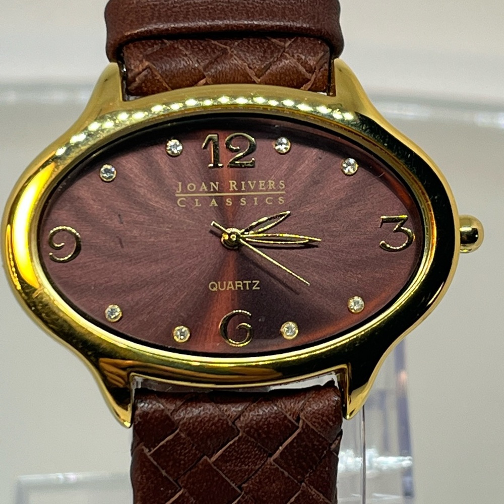 JOAN RIVERS! A beautiful brown watch with genuine brown leather band!! Classy!
